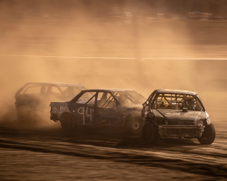 A photograph from Dusty Times of cars in a derby crashing into each other